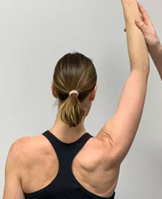 Patient med abducerad axel.